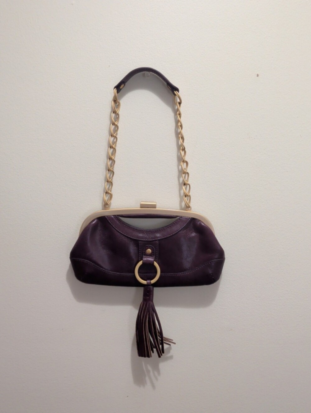 Latico USA Leather Clutch Handbag with Gold Chain Accents and Tassel